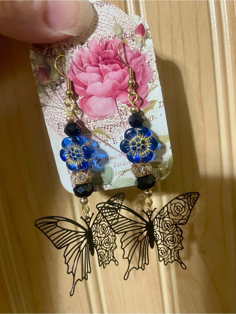 Hand Crafted Blue Floral Glass and Black Butterfly Drop Earrings